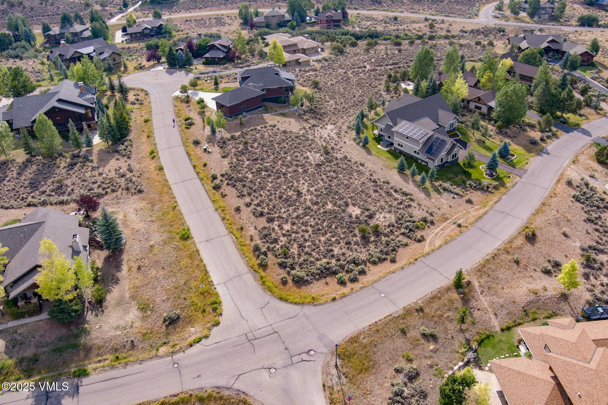 259 Harrier Circle Eagle, CO 81631 - Photo 12 of 28 an aerial view of a house with a yard and garden