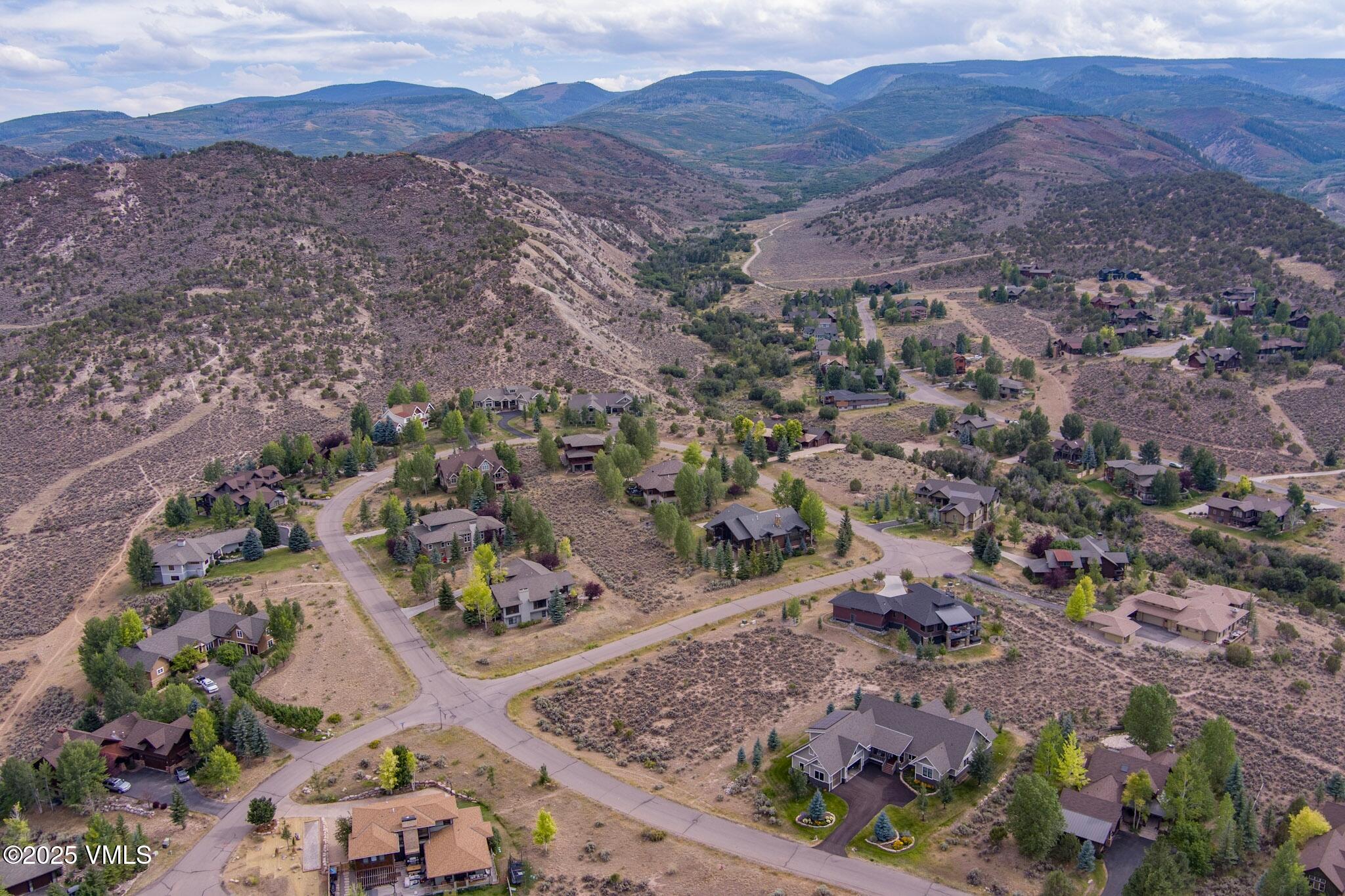 259 Harrier Circle Eagle, CO 81631 - Photo 13 of 28 an aerial view of residential house and sandy dunes