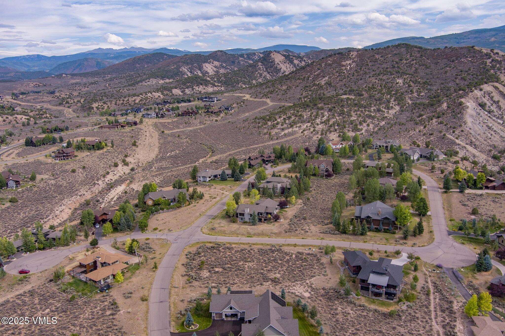 259 Harrier Circle Eagle, CO 81631 - Photo 14 of 28 an aerial view of a house with a yard