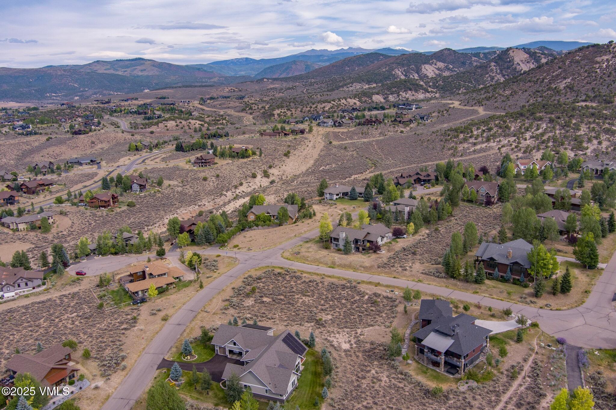 259 Harrier Circle Eagle, CO 81631 - Photo 15 of 28 an aerial view of a house with a yard
