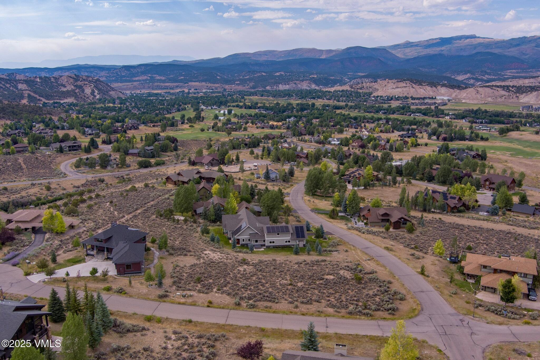 259 Harrier Circle Eagle, CO 81631 - Photo 21 of 28 a view of a city with mountains in the background