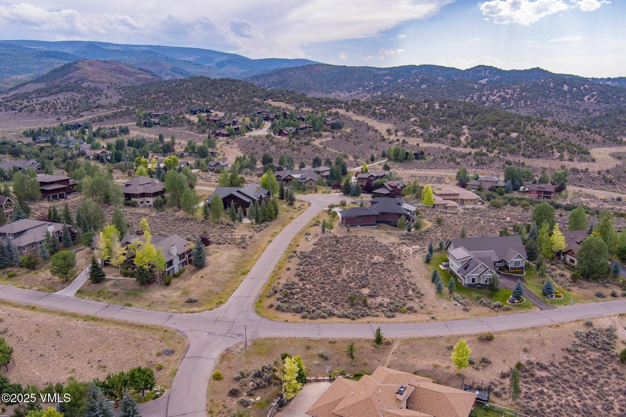 259 Harrier Circle Eagle, CO 81631 - Photo 23 of 28 an aerial view of residential house and sandy dunes