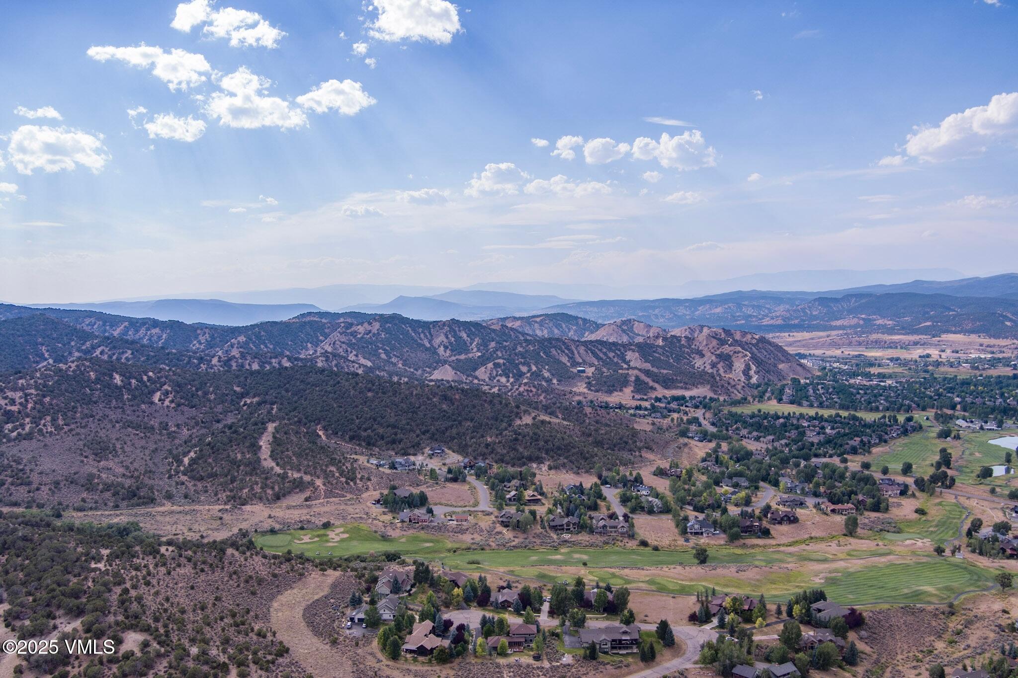 259 Harrier Circle Eagle, CO 81631 - Photo 26 of 28 a view of a city with mountains in the background