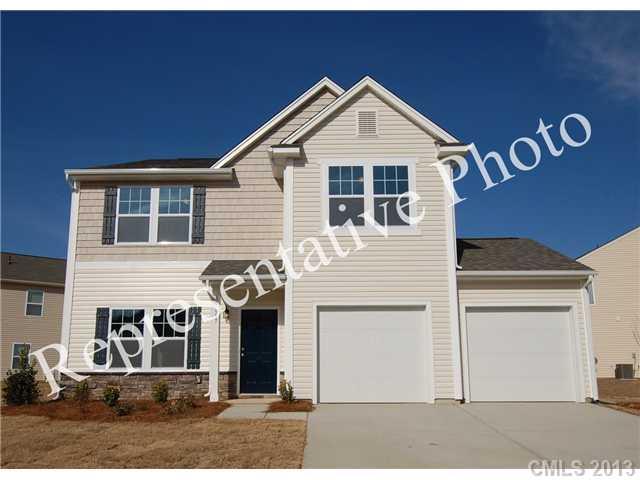 629 Rook Road, Unit 35 Charlotte, NC 28216 - Photo 1 of 1 a front view of a house with parking space
