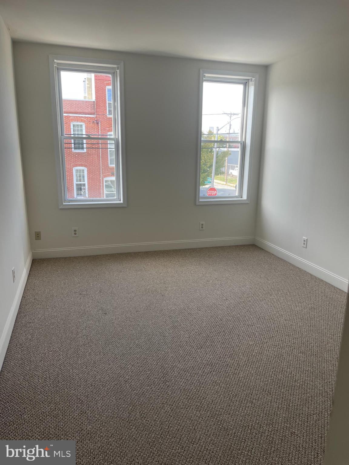 1403 Hull Street Baltimore, MD 21230 - Photo 3 of 15 an empty room with a window