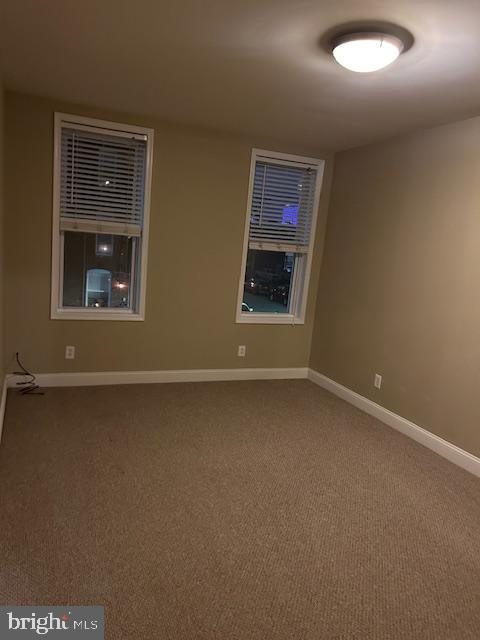1403 Hull Street Baltimore, MD 21230 - Photo 8 of 15 an empty room with a window