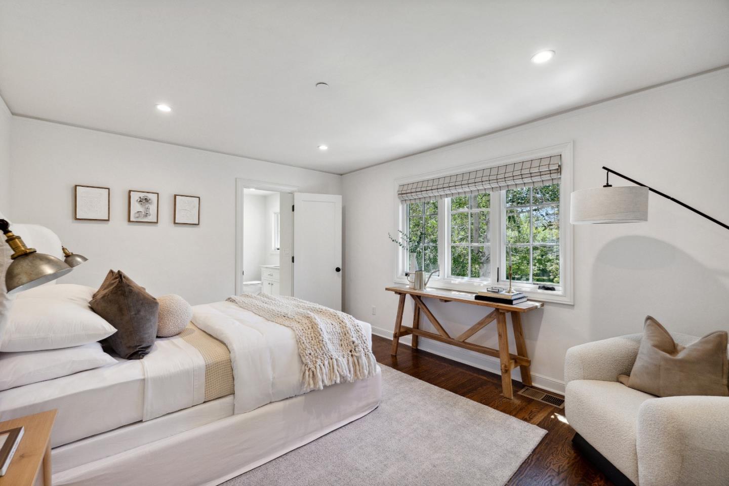 540 Chelmsford Road Hillsborough, CA 94010 - Photo 22 of 49 a bedroom with a bed and wooden floor
