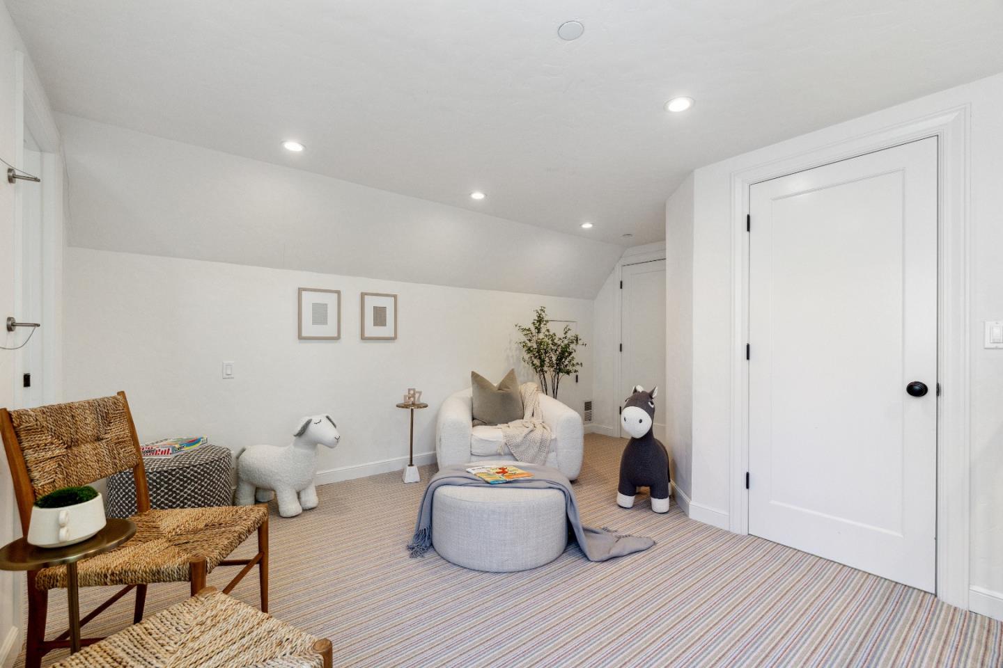 540 Chelmsford Road Hillsborough, CA 94010 - Photo 31 of 49 a living room with furniture and wooden floor