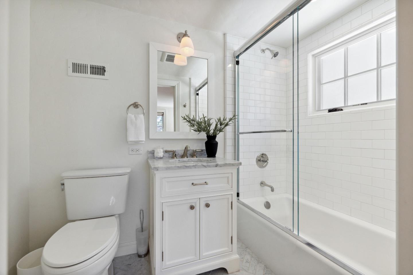 540 Chelmsford Road Hillsborough, CA 94010 - Photo 33 of 49 a bathroom with a sink a toilet and shower
