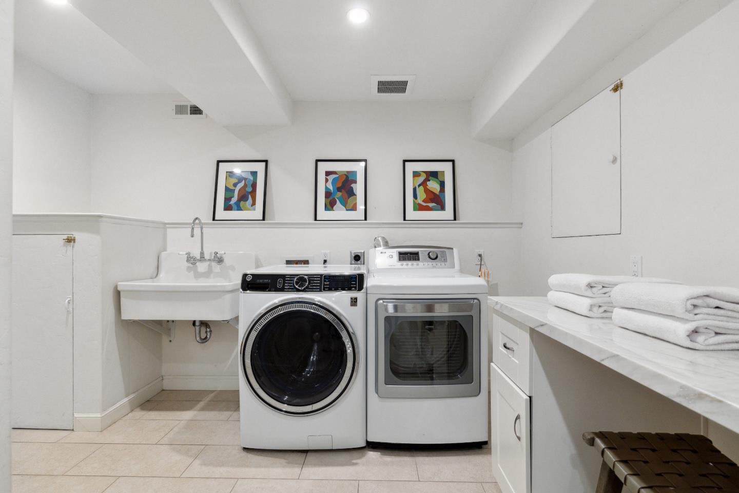 540 Chelmsford Road Hillsborough, CA 94010 - Photo 36 of 49 a utility room with sink dryer and washer