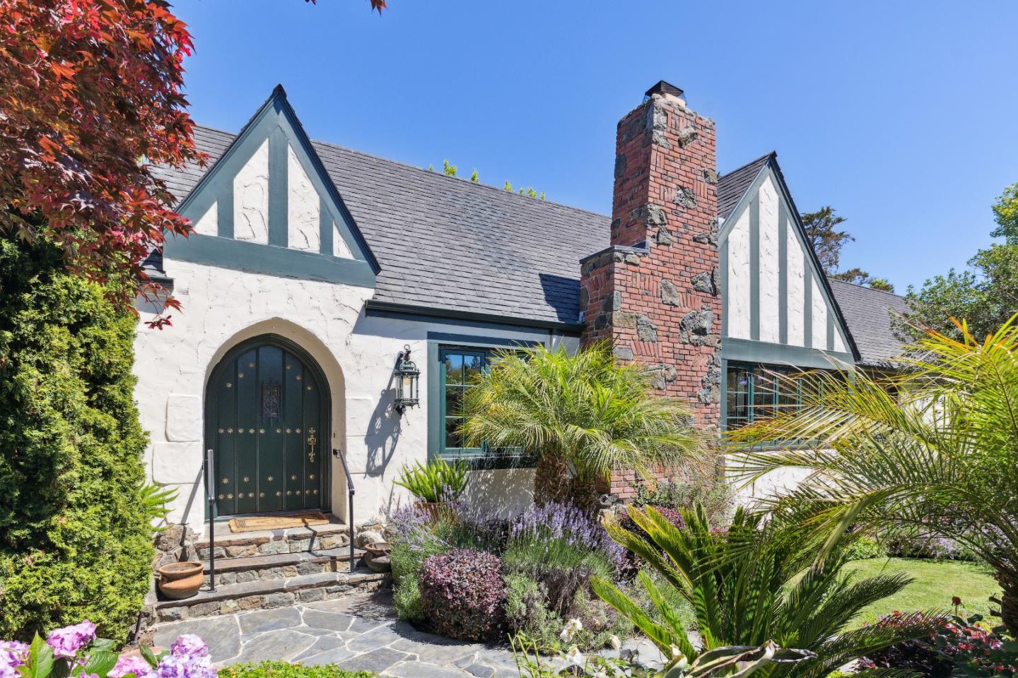 540 Chelmsford Road Hillsborough, CA 94010 - Photo 4 of 49 front view of a house with a garden