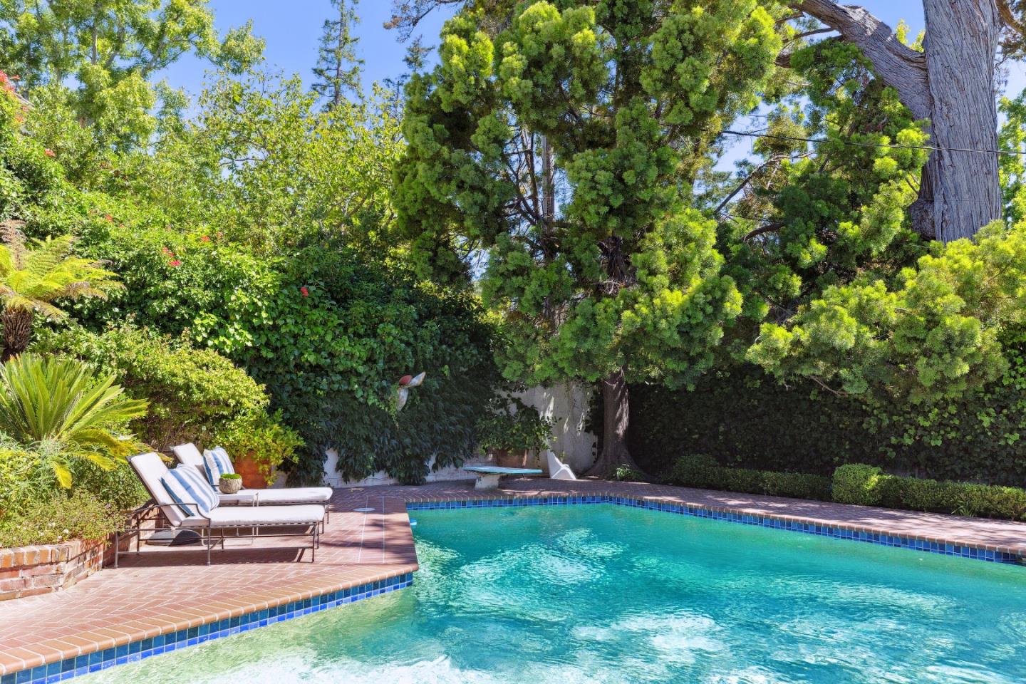 540 Chelmsford Road Hillsborough, CA 94010 - Photo 44 of 49 a view of a backyard with sitting area