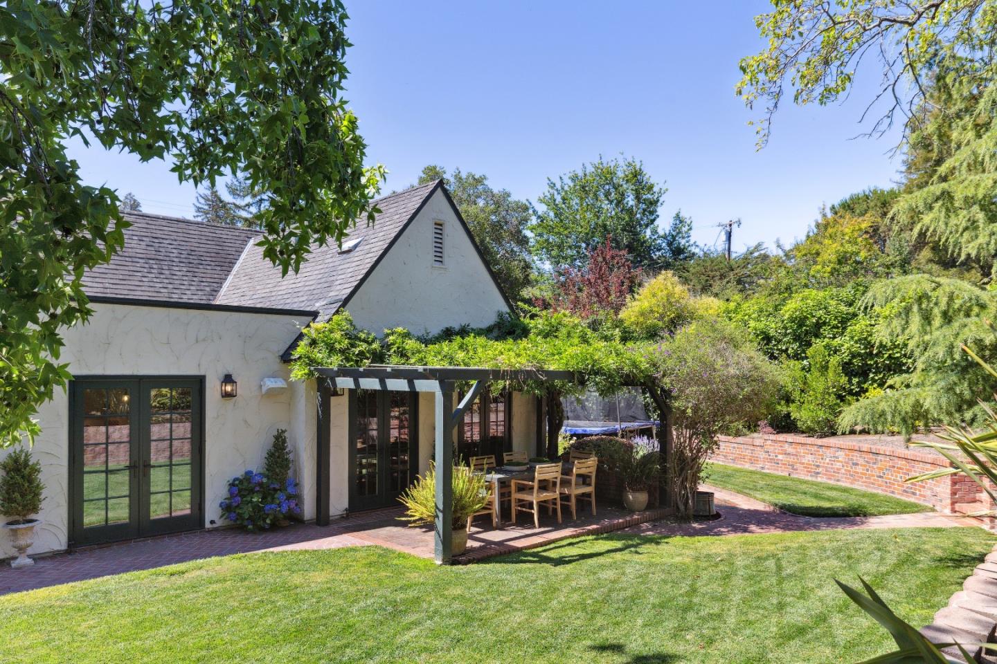 540 Chelmsford Road Hillsborough, CA 94010 - Photo 45 of 49 front view of a house with a yard