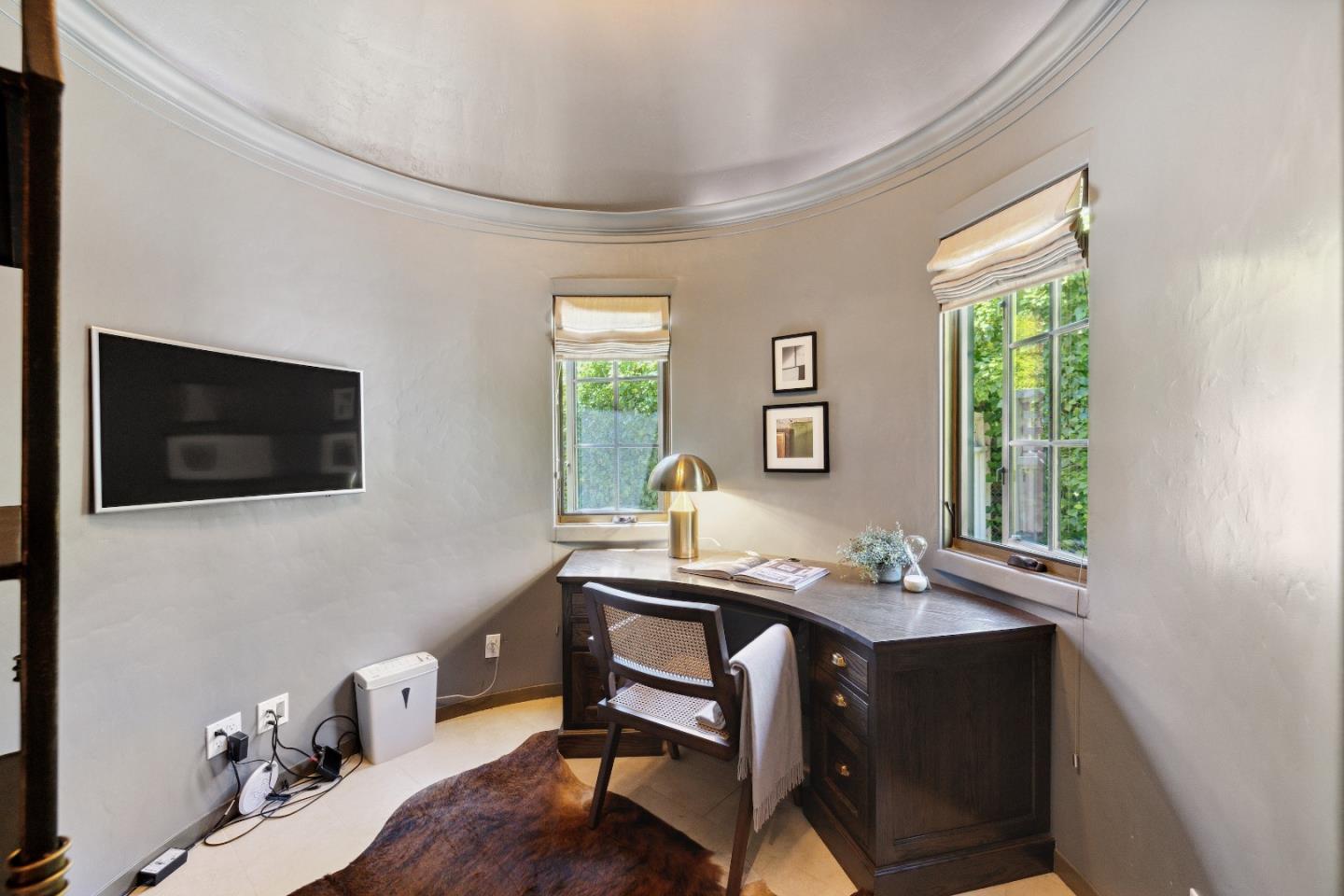 540 Chelmsford Road Hillsborough, CA 94010 - Photo 8 of 49 a view of a workspace with furniture and a window