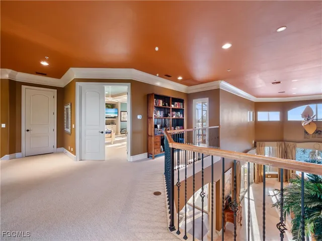 a view of a livingroom with furniture and windows