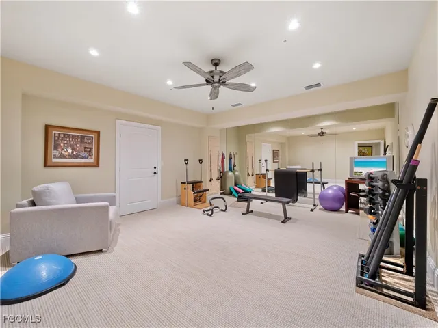 a view of swimming pool with seating area