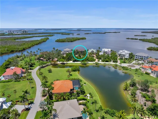 a view of a lake with a building in the background
