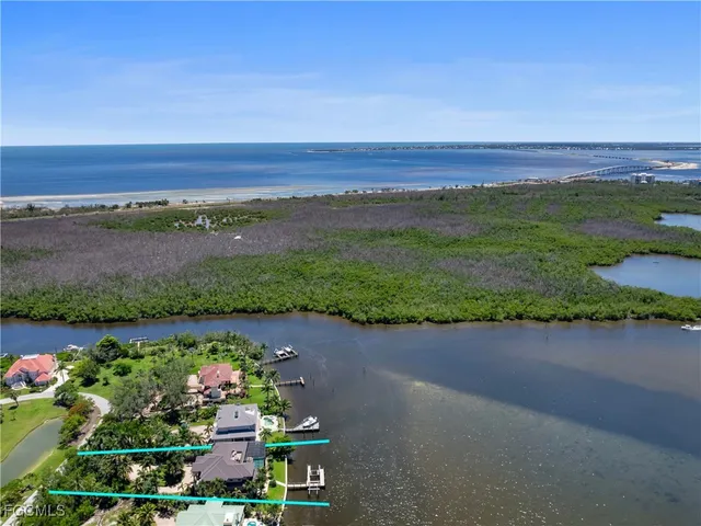 an aerial view of a house with a garden