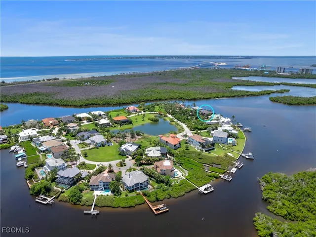 an aerial view of a chairs and table on the terrace
