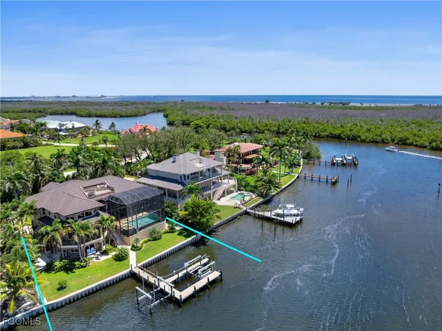 an aerial view of a golf course with parking space