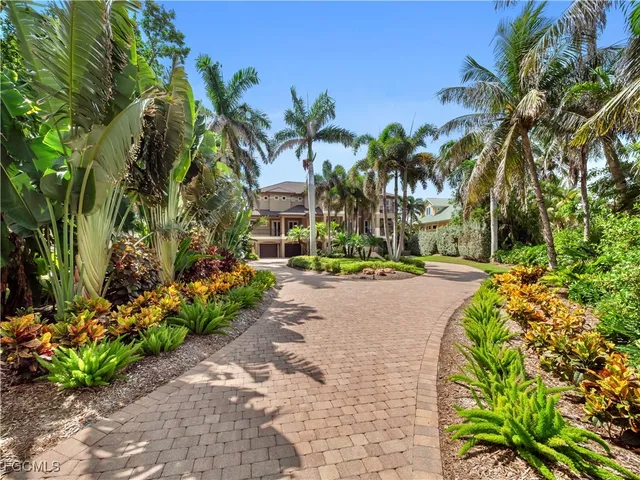 a view of a balcony with plants