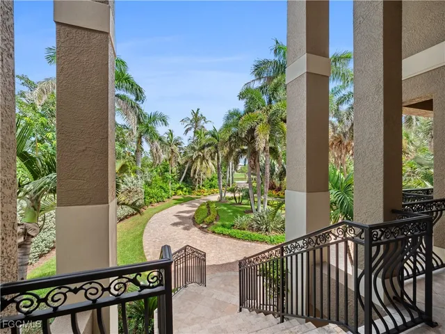 a living room with furniture fireplace and flat screen tv