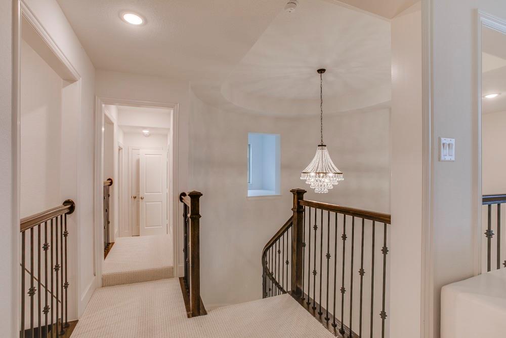 4059 Marble Hill Road Frisco, TX 75034 - Photo 25 of 40 a view of a hallway with windows and stairs