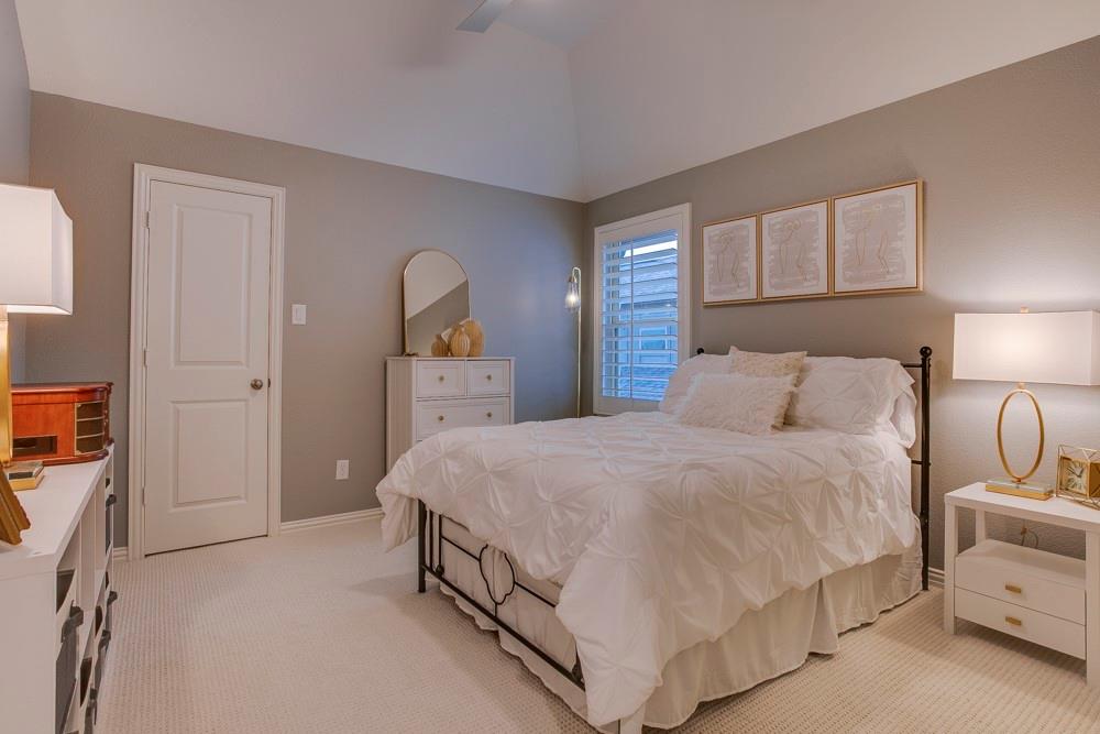 4059 Marble Hill Road Frisco, TX 75034 - Photo 27 of 40 a bedroom with a bed and a cabinets