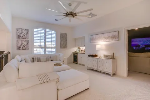 a bedroom with bed and window