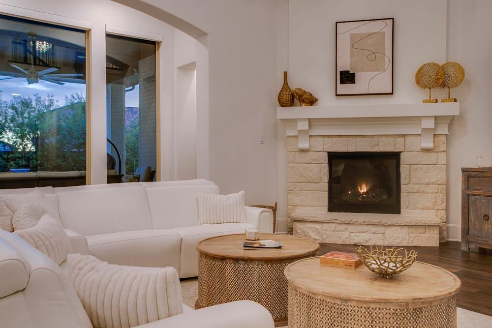 4059 Marble Hill Road Frisco, TX 75034 - Photo 10 of 40 a living room with furniture and a fireplace