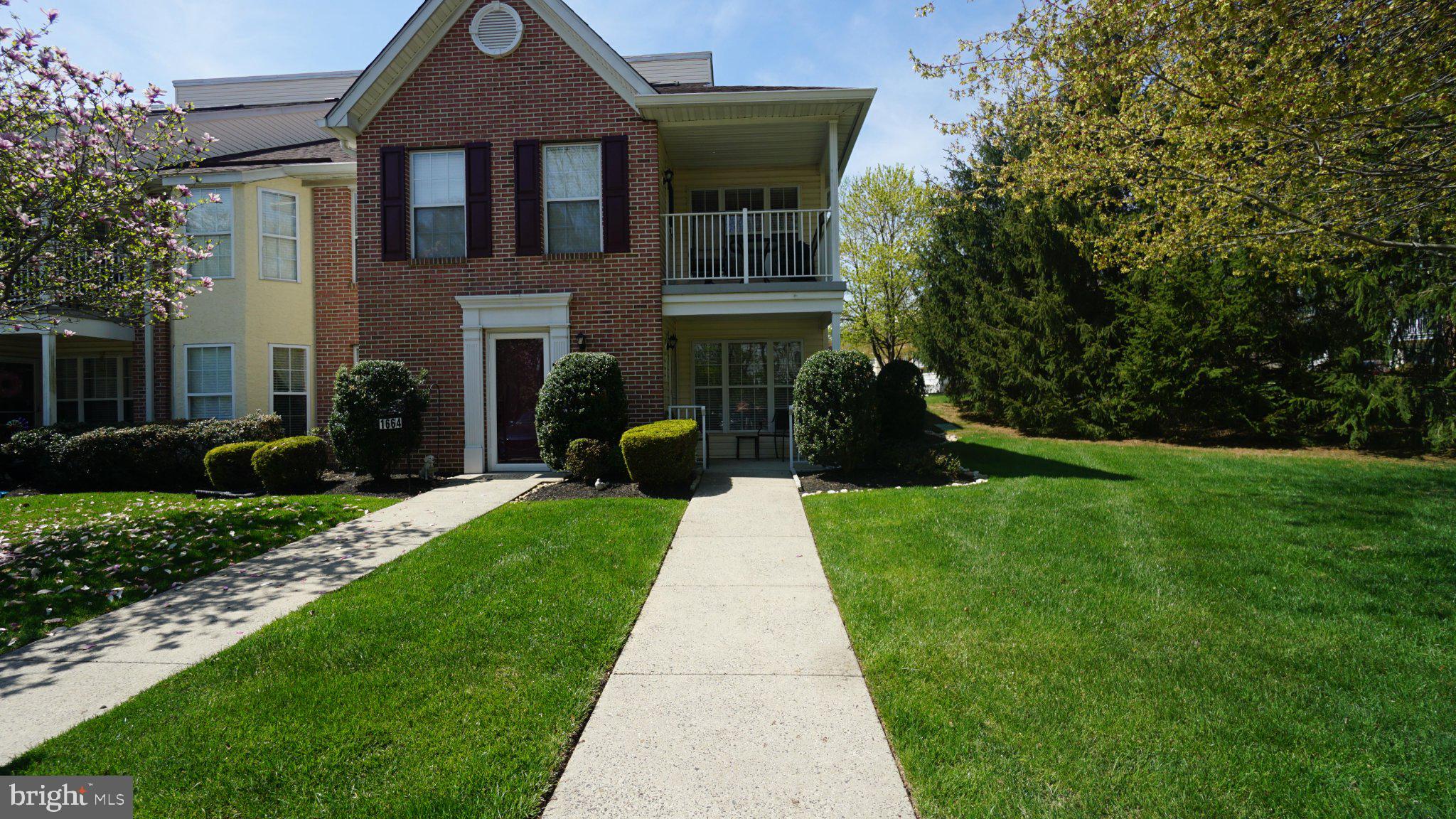 1662 Gibson Road Bensalem, PA 19020 - Photo 4 of 24 Charming brick facade with lush greenery.