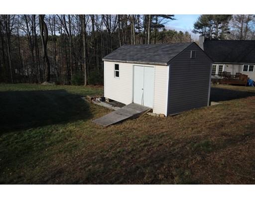 212 Brookfield Road Fiskdale, MA 01518 - Photo 5 of 19 a front view of a house with a yard