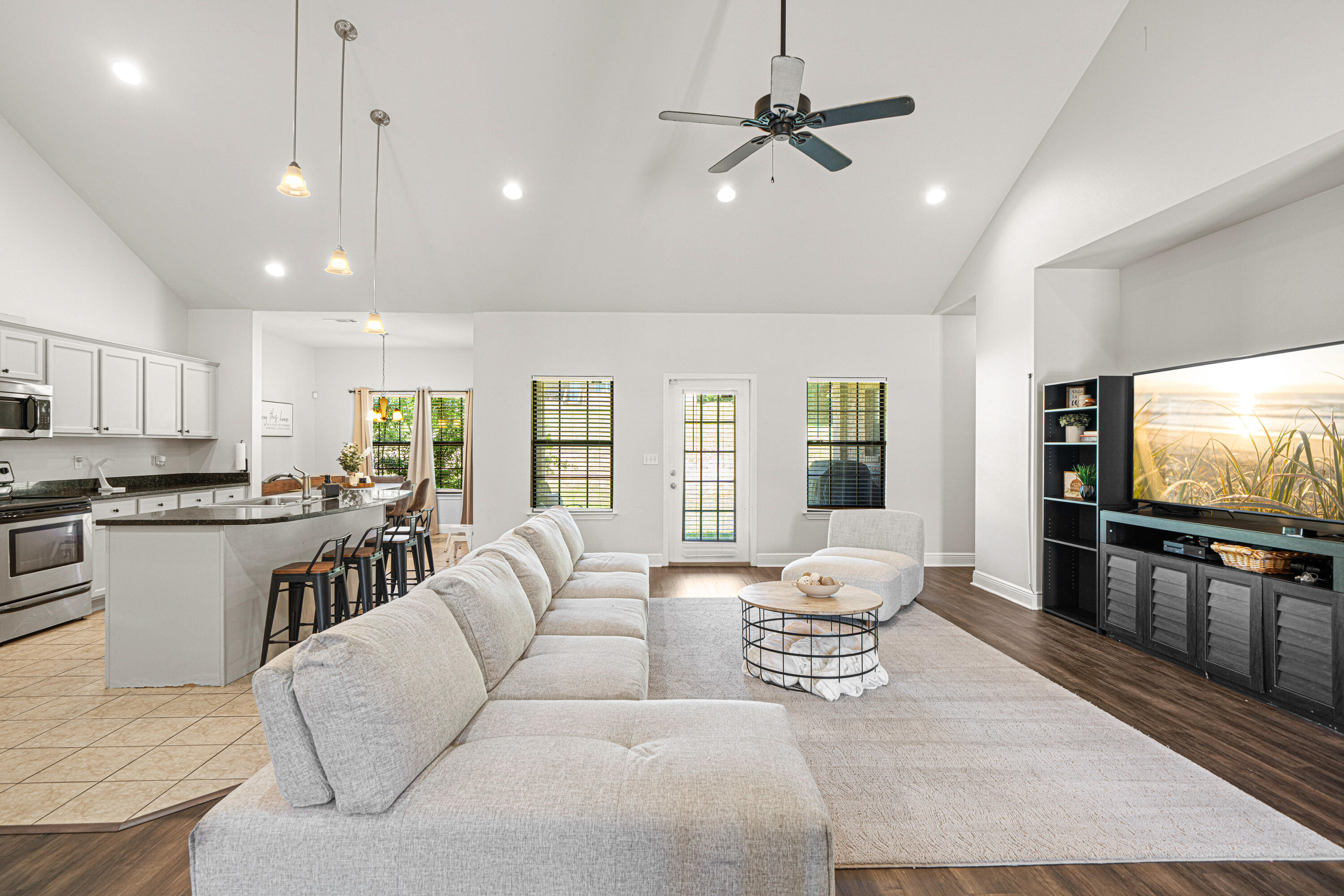3263 Chapelwood Drive Crestview, FL 32539 - Photo 12 of 39 a living room with furniture and a flat screen tv