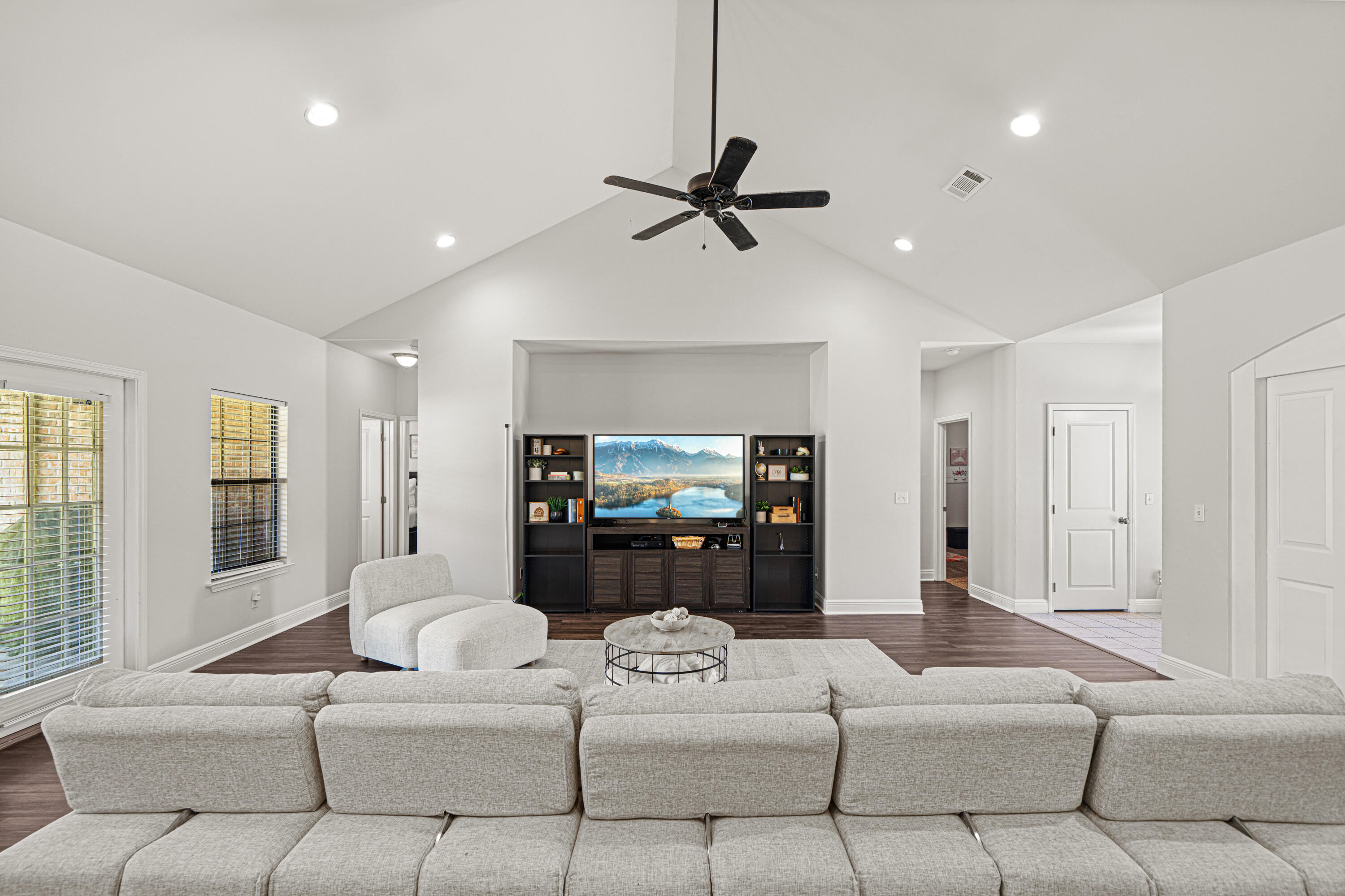 3263 Chapelwood Drive Crestview, FL 32539 - Photo 14 of 39 a living room with furniture and a large window