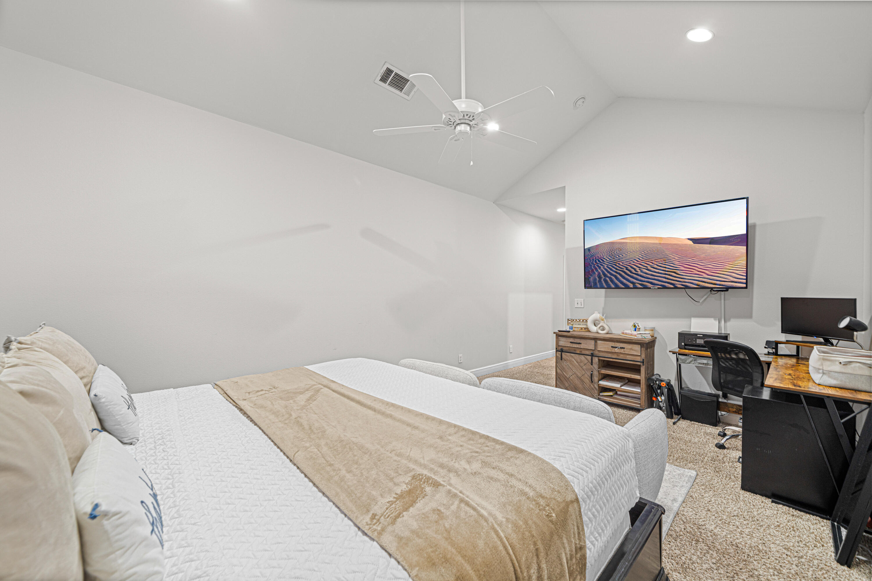 3263 Chapelwood Drive Crestview, FL 32539 - Photo 19 of 39 a bedroom with a bed and a flat screen tv