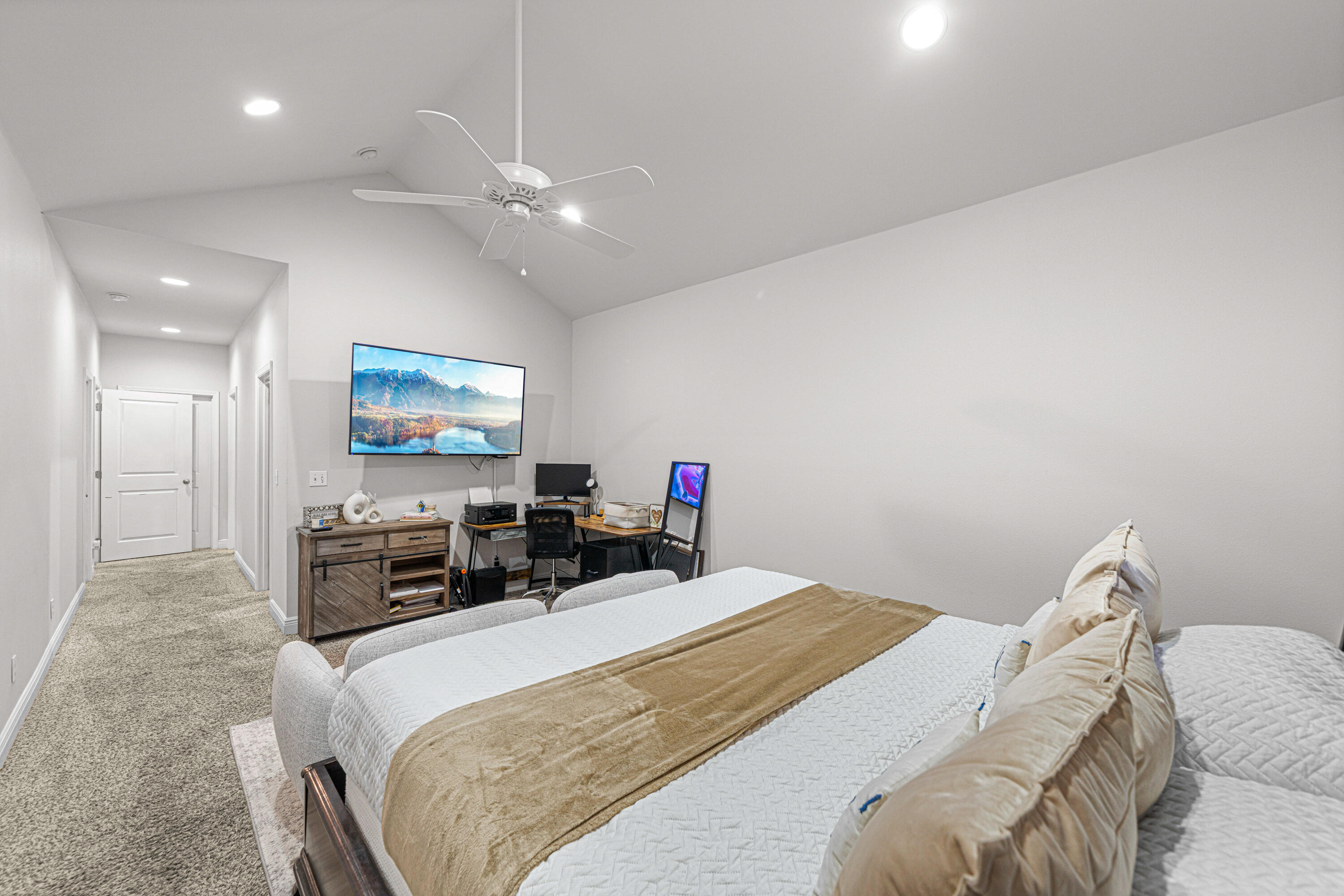 3263 Chapelwood Drive Crestview, FL 32539 - Photo 20 of 39 a bedroom with a bed and a flat screen tv