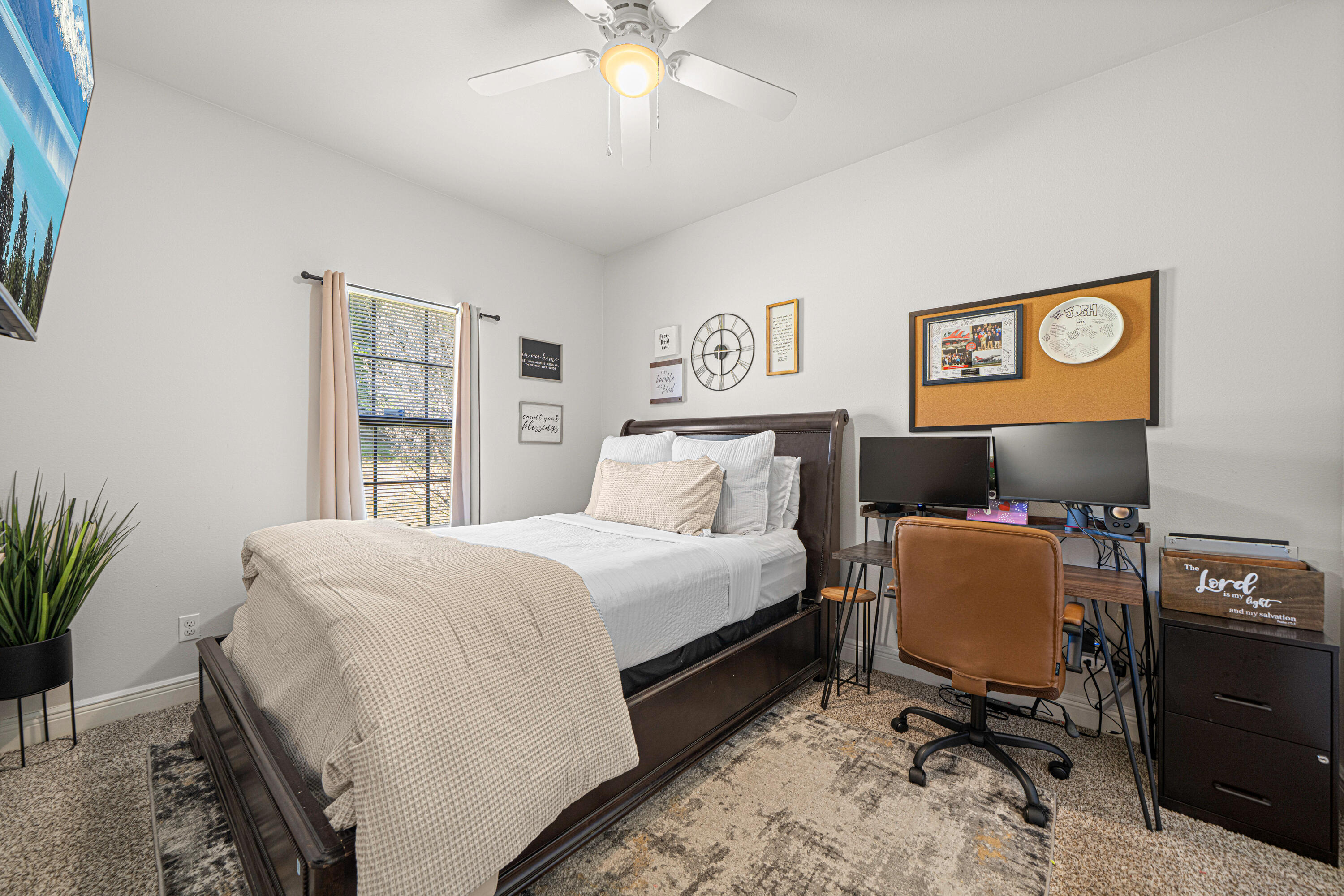 3263 Chapelwood Drive Crestview, FL 32539 - Photo 31 of 39 a bedroom with a bed and a window