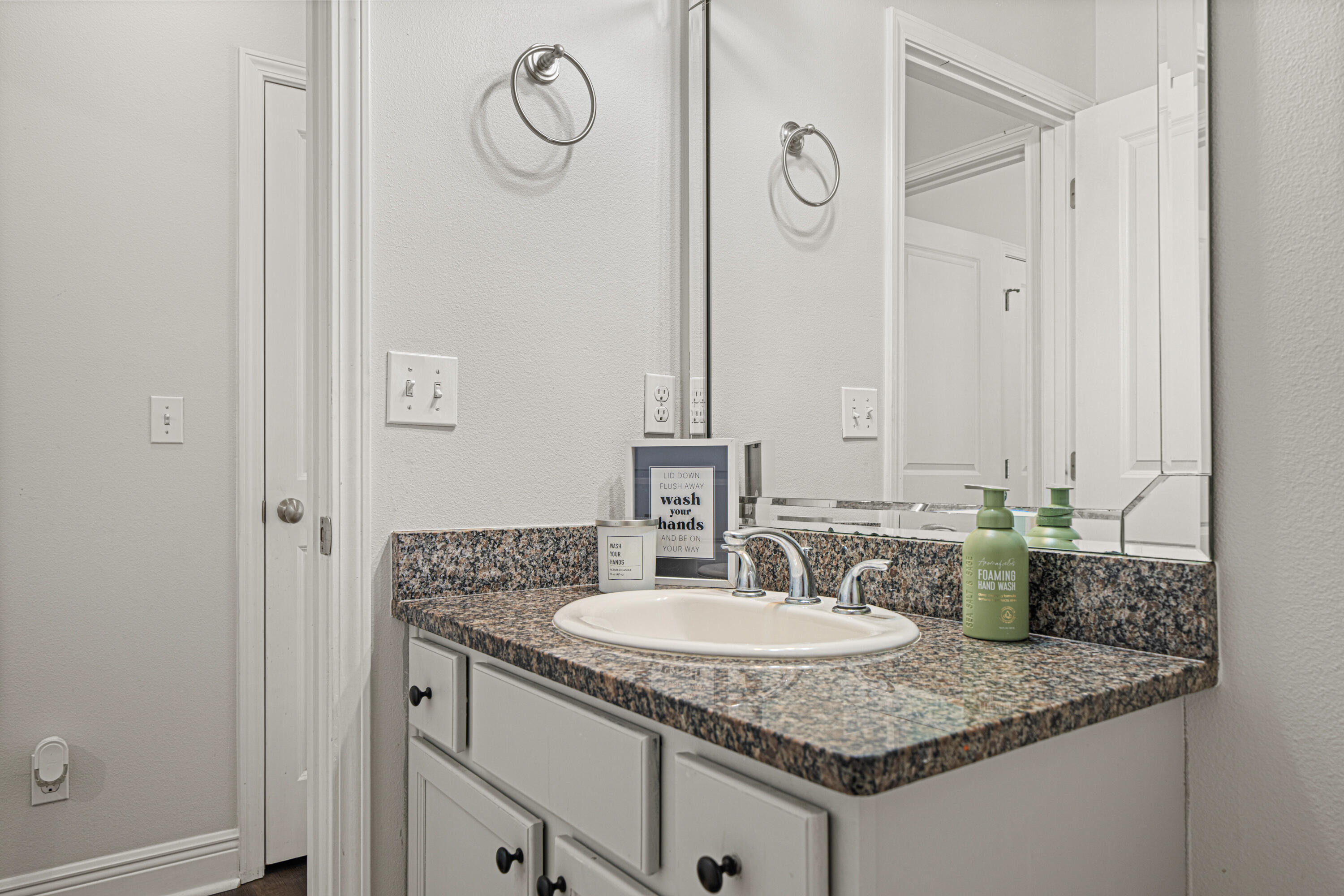 3263 Chapelwood Drive Crestview, FL 32539 - Photo 34 of 39 a sink and a mirror