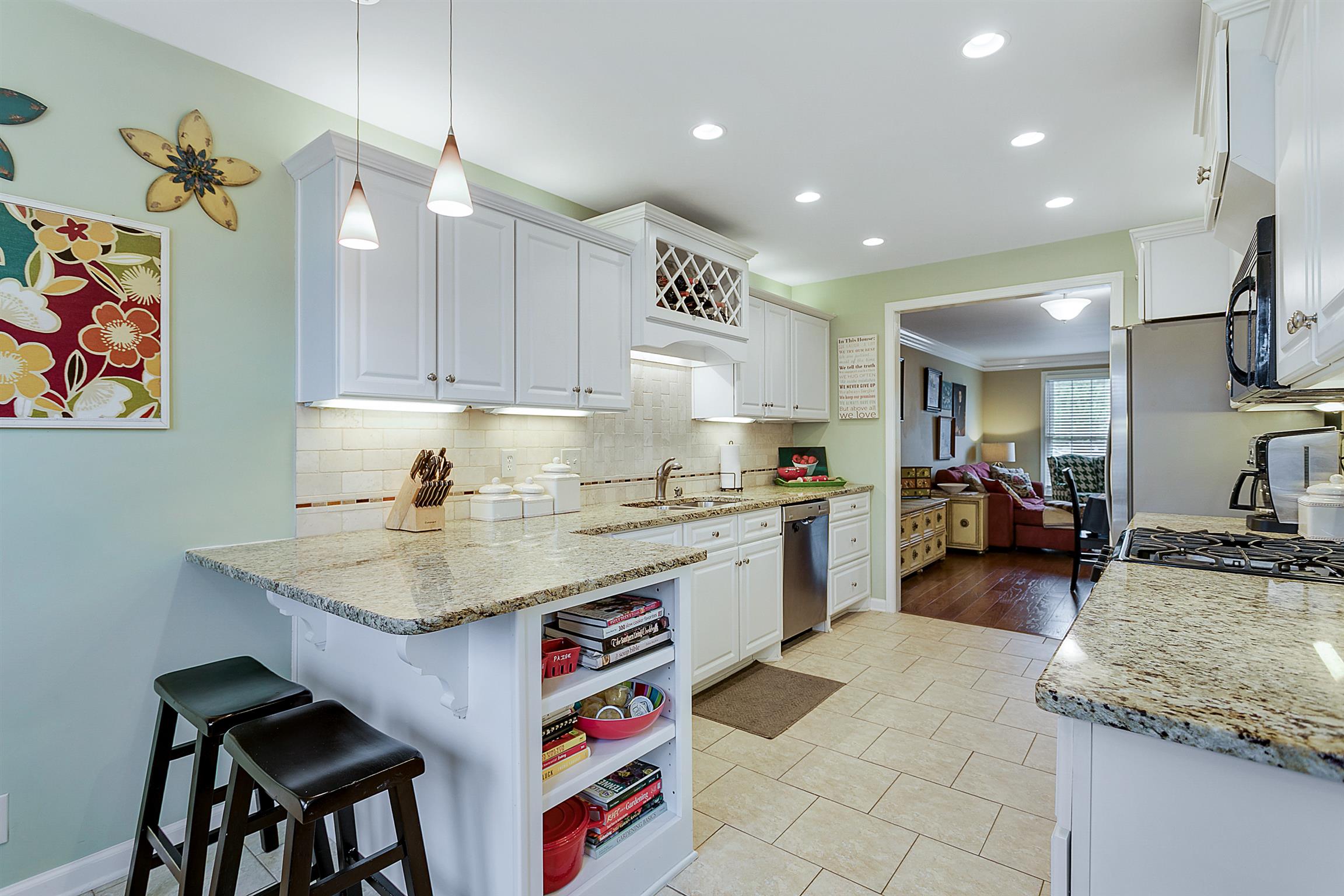1309 General George Patton Road, Unit 1309 Nashville, TN 37221 - Photo 4 of 30 The eat-in bar adds a wonderful spot for quick snacks; the adjacent shelving provides a great landing pad for all manner of things. Picture yourself living here!