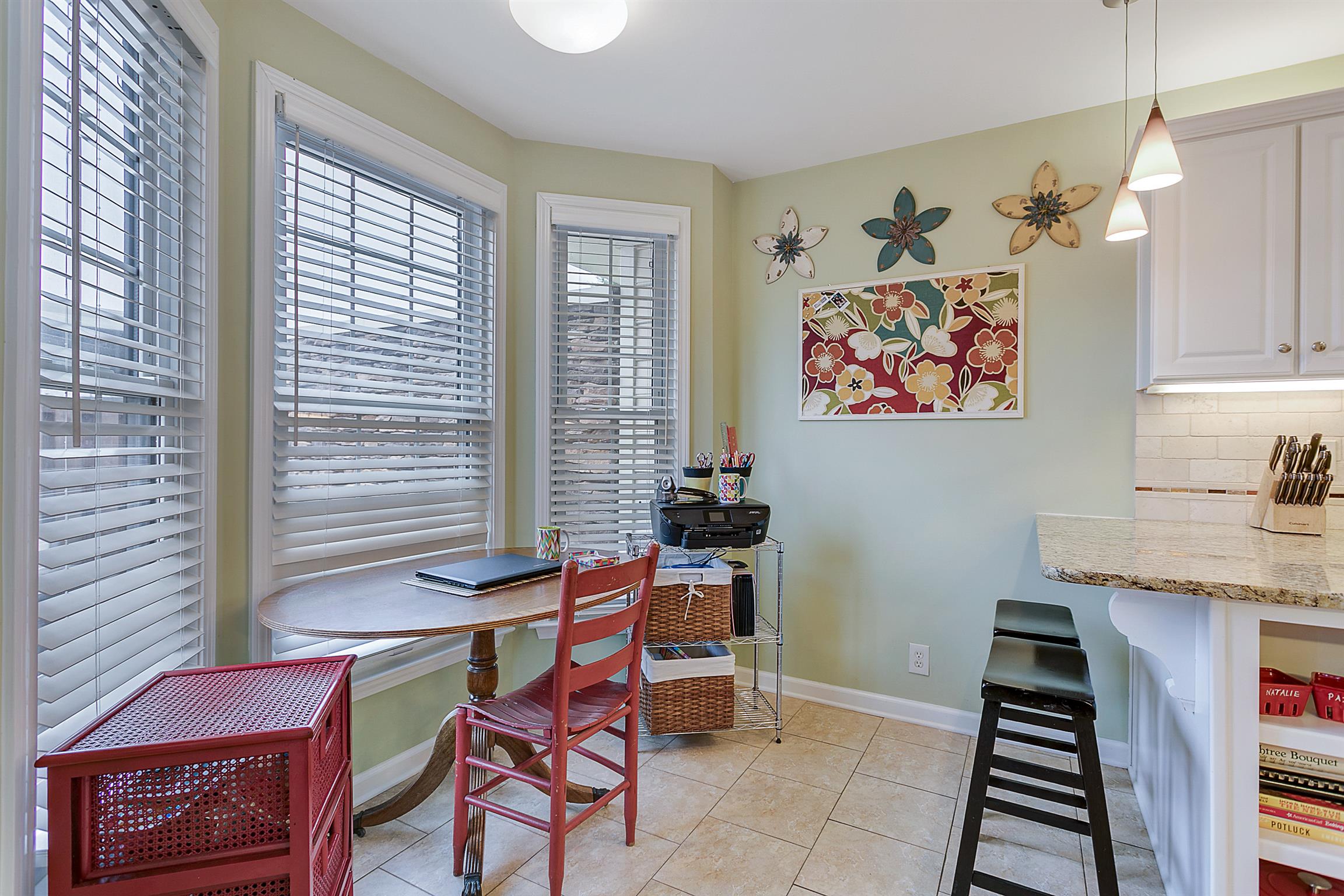 1309 General George Patton Road, Unit 1309 Nashville, TN 37221 - Photo 5 of 30 The bay-window breakfast nook with a view to the patio is currently used as a home office, but could easily accommodate a larger table for sit-down meals.