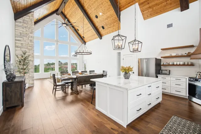 a living room with furniture and a table