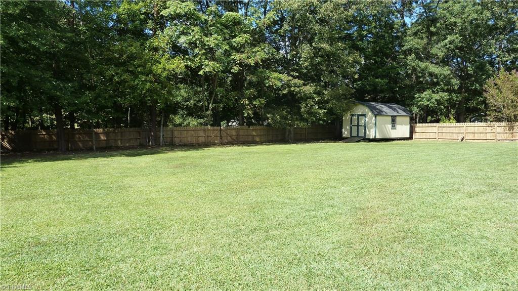 5054 Cobblestone Road Winston-Salem, NC 27106 - Photo 26 of 30 Large flat backyard