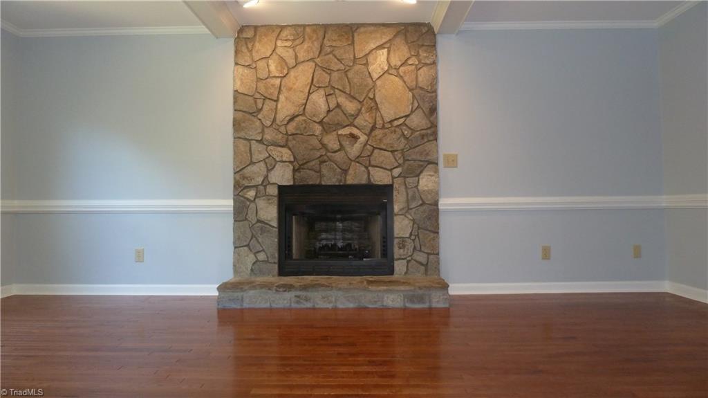5054 Cobblestone Road Winston-Salem, NC 27106 - Photo 8 of 30 Den with stone fireplace