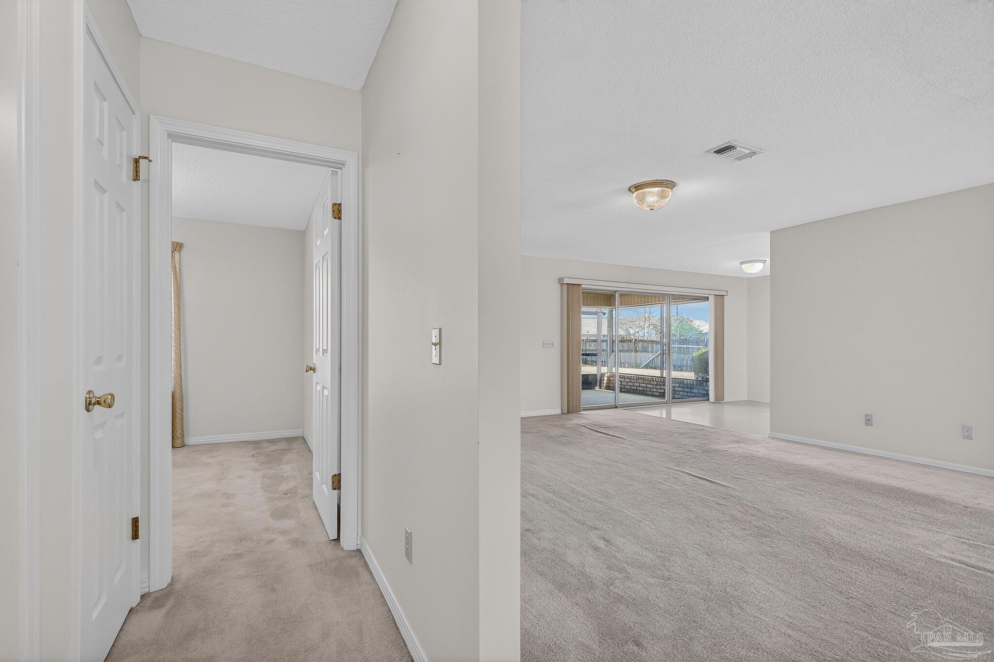 2236 Cricket Ridge Drive Cantonment, FL 32533 - Photo 39 of 57 a view of an empty room with window and cabinet