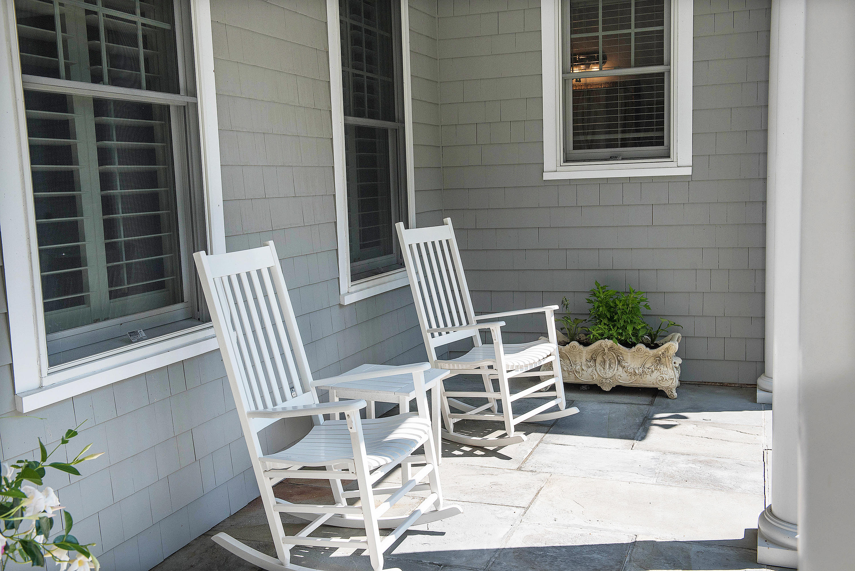 9 River Road Norwalk, CT 06850 - Photo 43 of 47 a view of a chair and table in the balcony