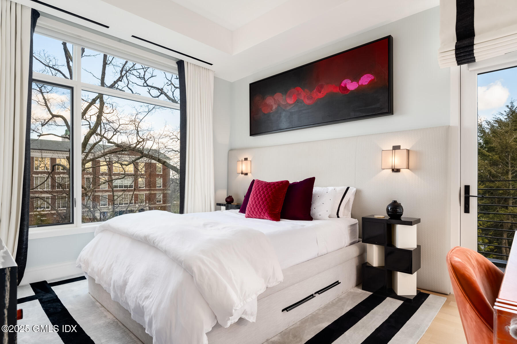 125 Field Point Road, Unit PH A6 Greenwich, CT 06830 - Photo 13 of 22 a bedroom with a bed and a flat screen tv