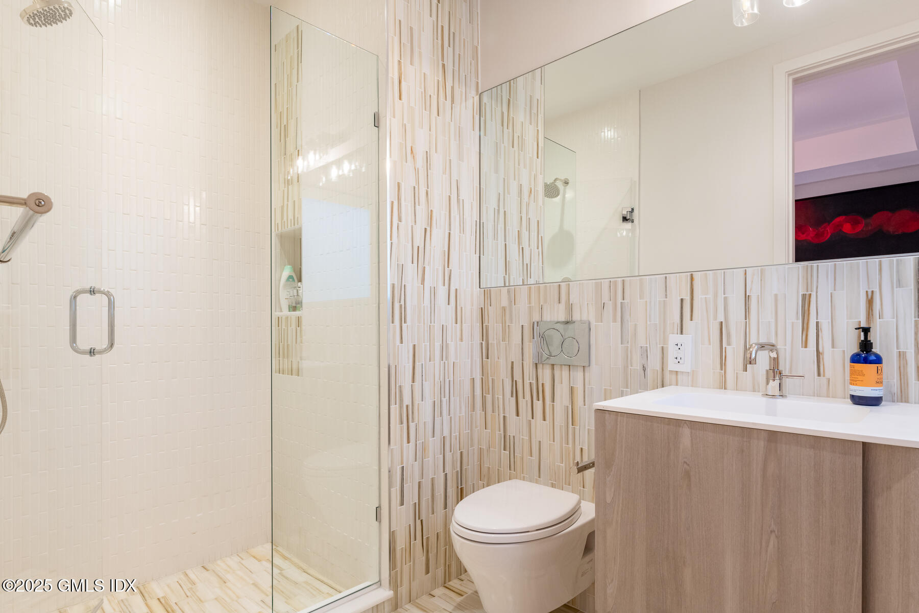 125 Field Point Road, Unit PH A6 Greenwich, CT 06830 - Photo 14 of 22 a bathroom with a sink toilet and shower
