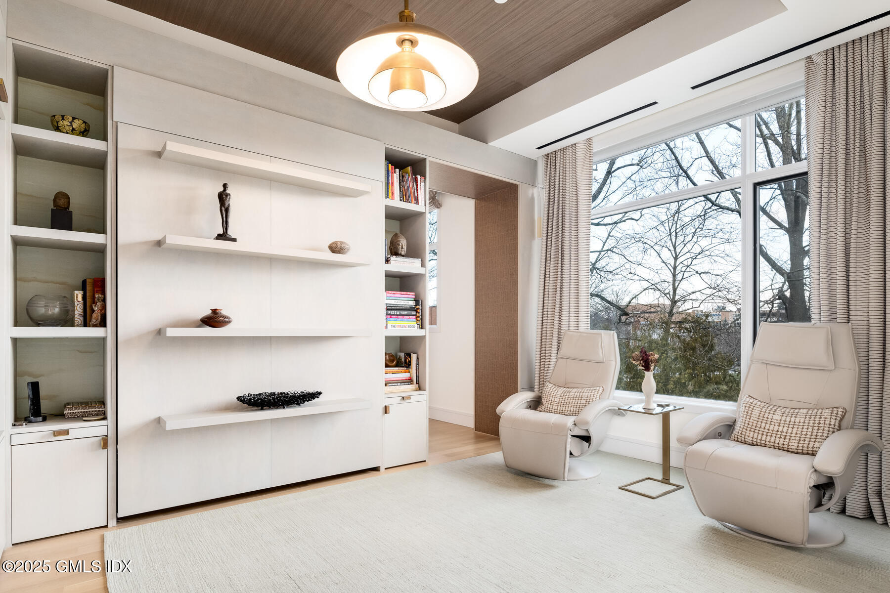 125 Field Point Road, Unit PH A6 Greenwich, CT 06830 - Photo 15 of 22 a living room with furniture and a large window