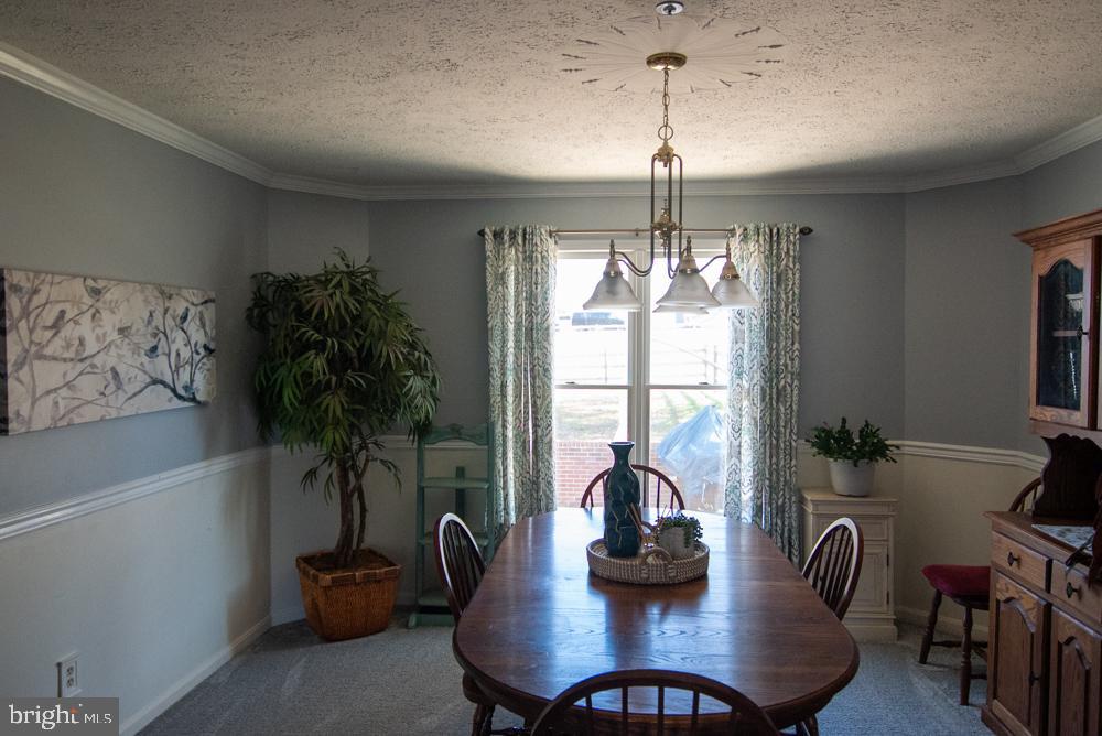 15900 Bald Eagle School Road Brandywine, MD 20613 - Photo 14 of 33 a dining room with furniture and window