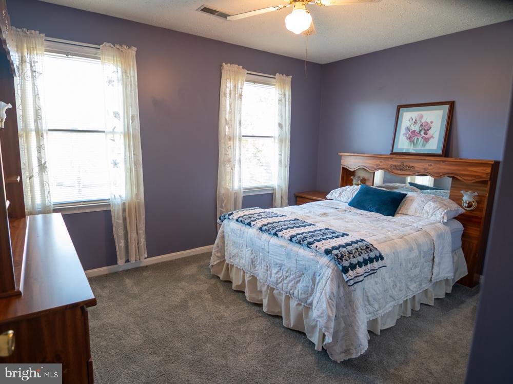 15900 Bald Eagle School Road Brandywine, MD 20613 - Photo 24 of 33 a bedroom with a large bed and a window